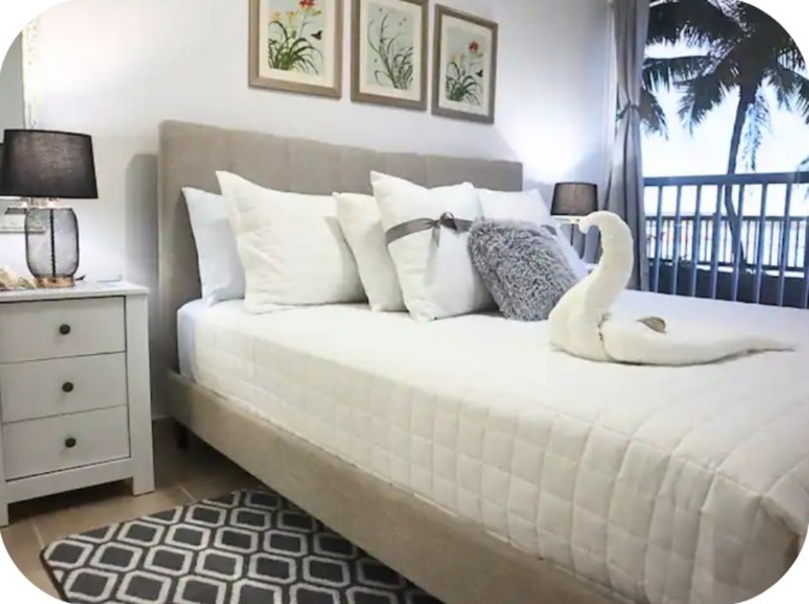 Primary bedroom with a comfortable king bed and ocean view